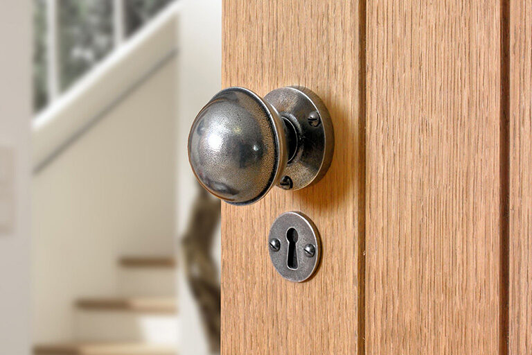 Door with lock and round door knob